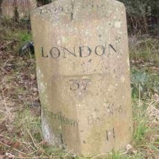 Milestone, Section of the old road, in a cul-de sac opp. entrance to Brodrick Farmhouse, NW sector of Six Bells roundabout