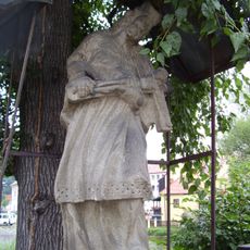 Statue of Saint John of Nepomuk on the head of Edvard Beneš Bridge in Český Krumlov