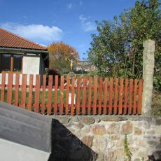 Kříž v Lešově u domu čp.48