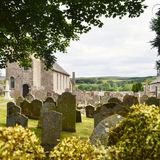 Bewcastle Roman fort, high cross shaft in St Cuthbert's churchyard, and Bew Castle medieval shell keep castle