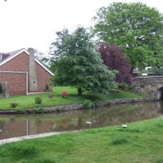 Marple Locks Number 15 and adjoining footbridge on Peak Forest Canal
