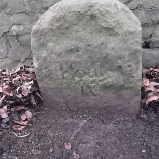 Milestone Against Roadside Wall Immediately To North Of Leylands Farm Cottages