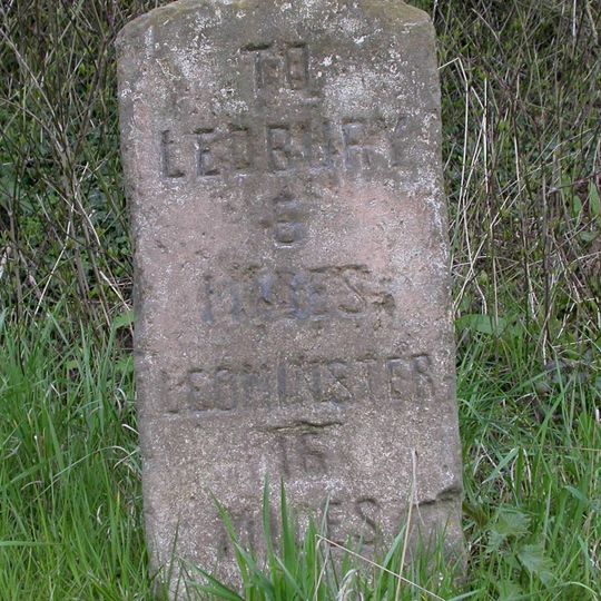 Milestone, N of village 50m N of lay-by