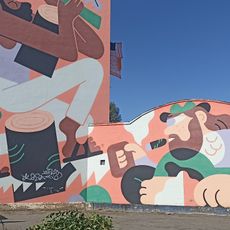 Mural sobre el deporte tradicional asturiano