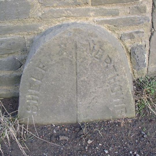 Boundary stone by Spaniard Hall at junction with Cross Lane at NGR SE 110287