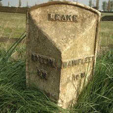 Milepost, E of jct with Shaw Lane (Main Road nr Heronshaw Hall)
