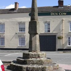 Milestone, opp."The Dun Cow" PH at crossroads with A426