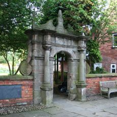 Forecourt wall and gateway of Wright's Almshouses