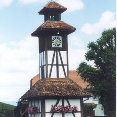 Little clock tower and farmhouse Buri