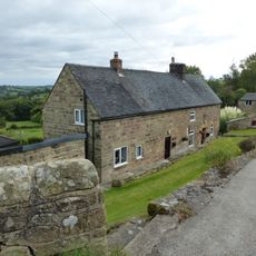 Farmhouse And Attached Outbuildings To The South Of Well Banks