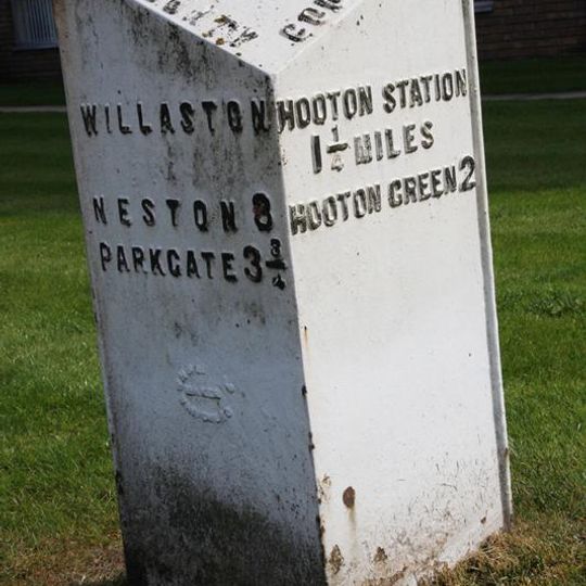Milepost, centre of village