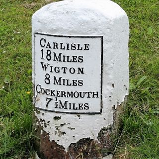 Milestone On West Side Of Former A595