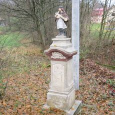 Socha svatého Jana Nepomuckého u silnice v Bělé u Turnova