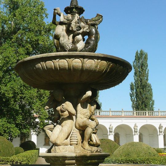 Tritons Fountain in Flower Garden