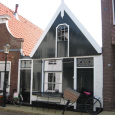 Gaaf klein pandje met houten voorschot