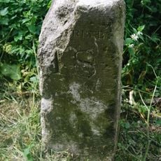 Milestone, Ashford Road, by No. 37, Orchard Field