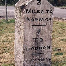 Milestone, jct with Poringland rd W of The Feathers