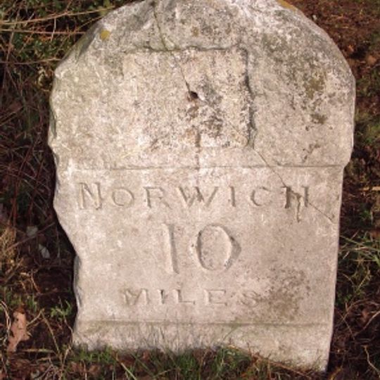 Milestone, 100m S of church