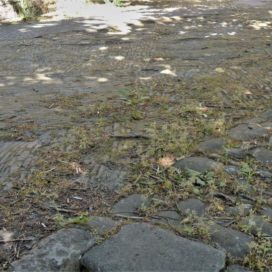 Raised Pavement At Entrance To Churchyard