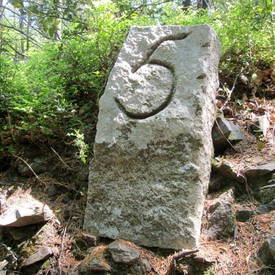Milestone, 300m W of Eastern gateway into Yarner Wood on trackway