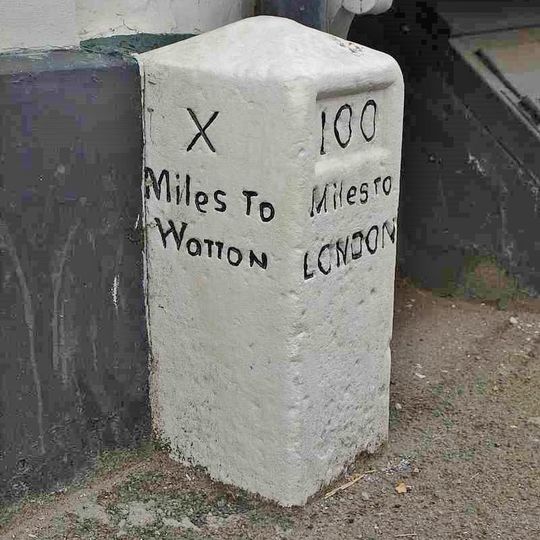 Milestone In Front Of George Hotel