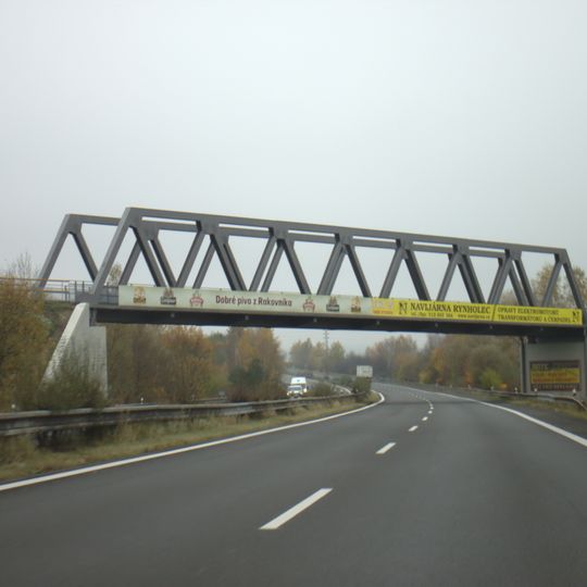 Bridge of former railway siding over D6 highway east of Tuchlovice