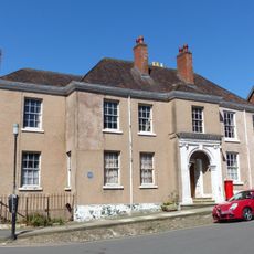 Oriel House and attached gate and railings