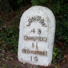 Milestone, by central road island