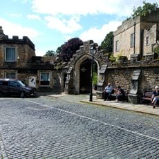 Castle Wall Including Market Lodge, Gateway And Bus Shelter