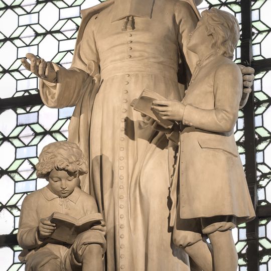 Saint Jean-Baptiste de la Salle avec deux enfants