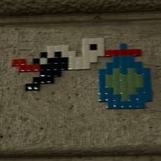 Cigogne avec un sac de couleur bleu dans le bec avec dessu un coeur de couleur vert