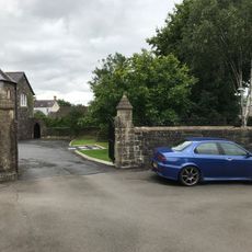 Walls, gates, piers and railings to The Vicarage