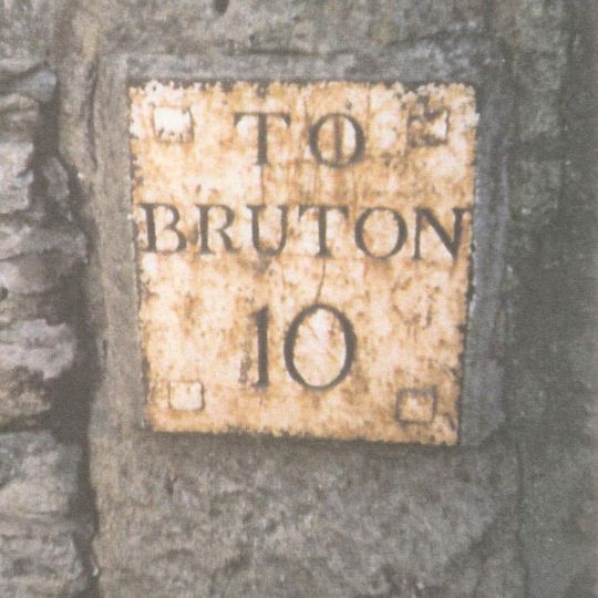 Milestone In Garden Wall Of Number 108