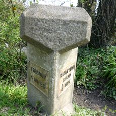 Milestone, S of Grampound Road village sign