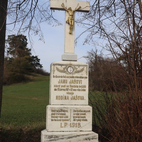 Kříž u stezky západně od Rudíkova