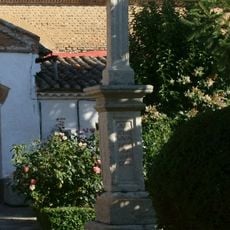Stone cross next to the Church of Saint Andrew