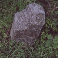 Milestone, Hythe Road, W of old filling station, beneath power lines