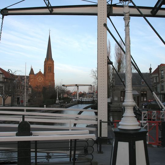 Sluiswerken met lantaarns in de Vliet