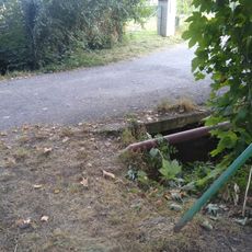 Most údolní cesty přes Šárecký potok mezi ulicí U Vizerky a domem U Vizerky čo. 1