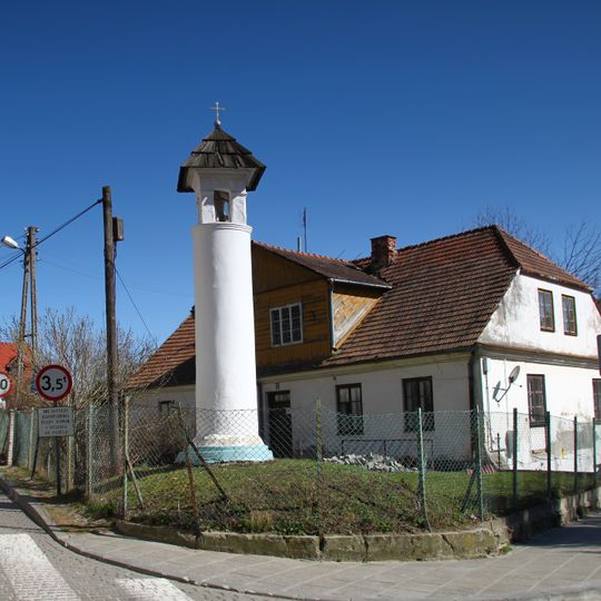 Christian wayside shrine at 2 Szkolna Street in Kazimierz Dolny