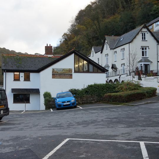 Summerhouse And Attached Retaining Wall And Terrace With Railings