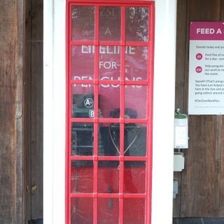 K3 Type Telephone Kiosk Underneath The Portals Of The Parrot House
